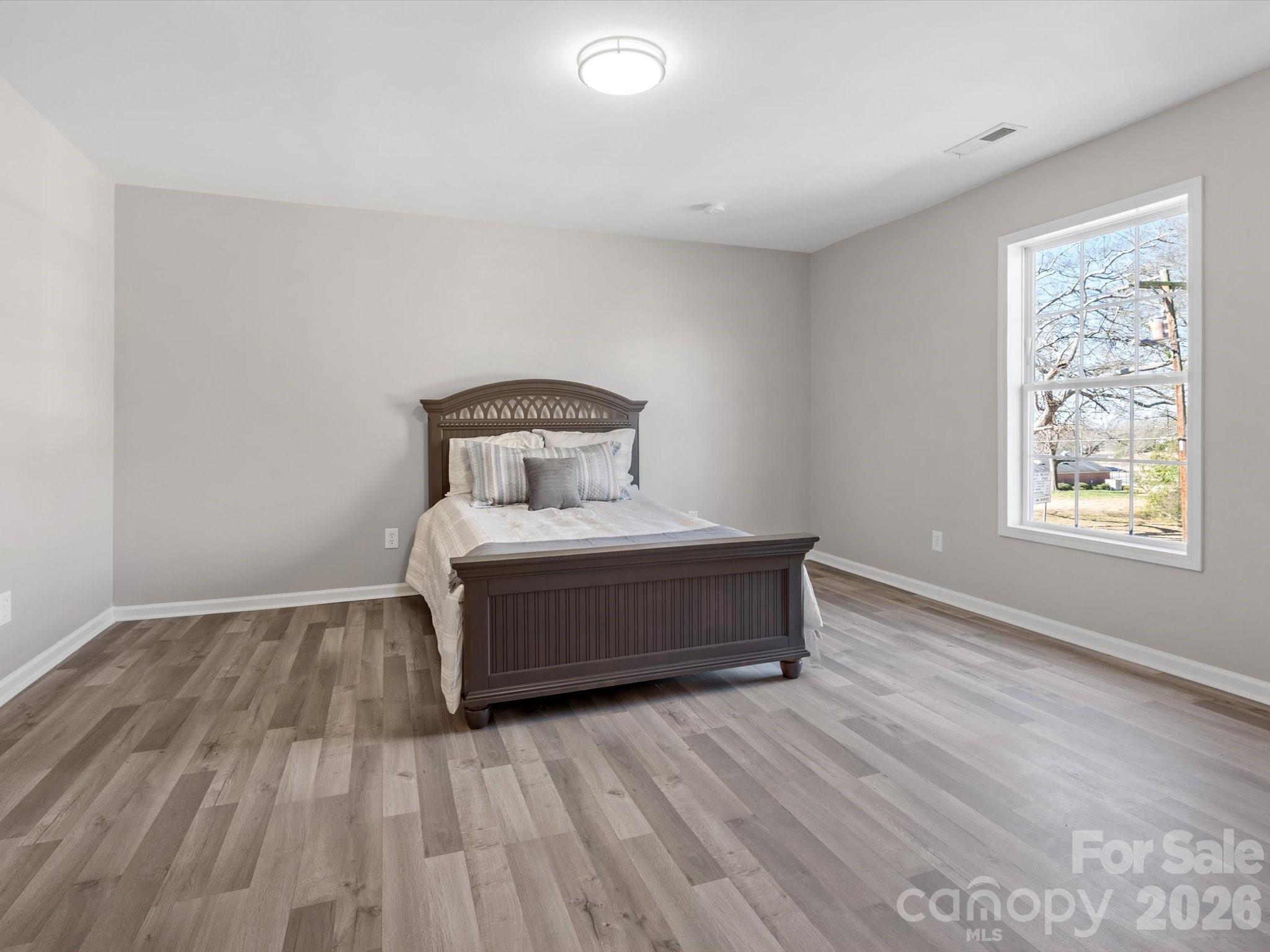 105 South York Street Lancaster, SC 29720 - Photo 24 of 28 a room with a bed and window
