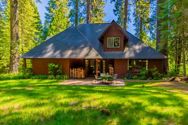 a outdoor space with patio fireplace and furniture