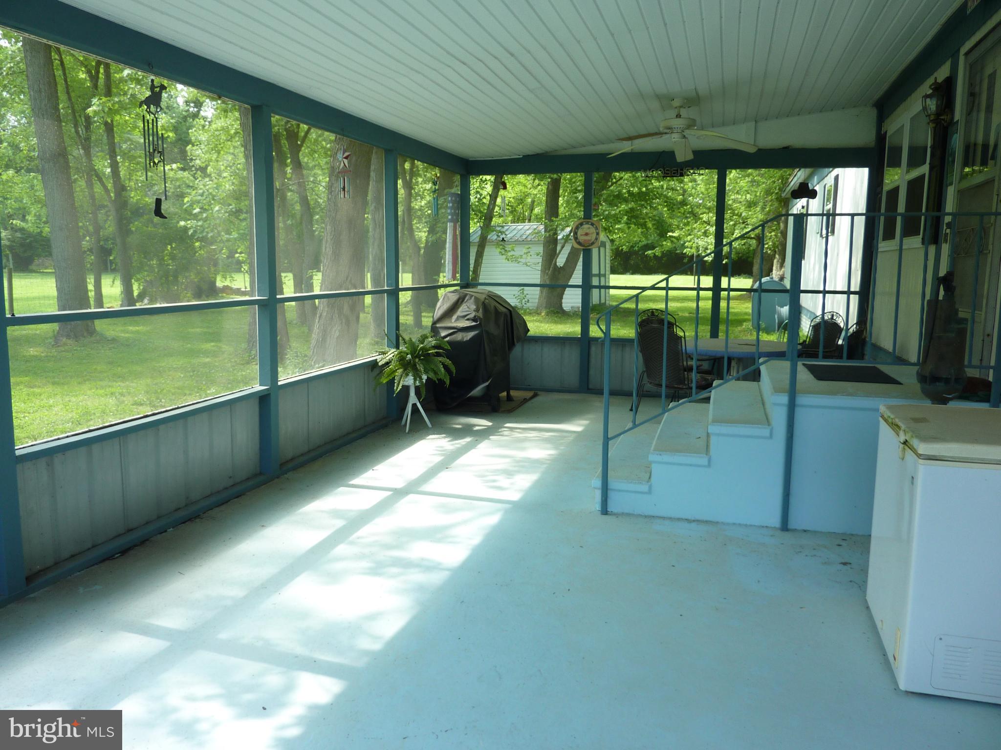 2723 Fords Corner Road Clayton, DE 19938 - Photo 3 of 25 Screened in Porch