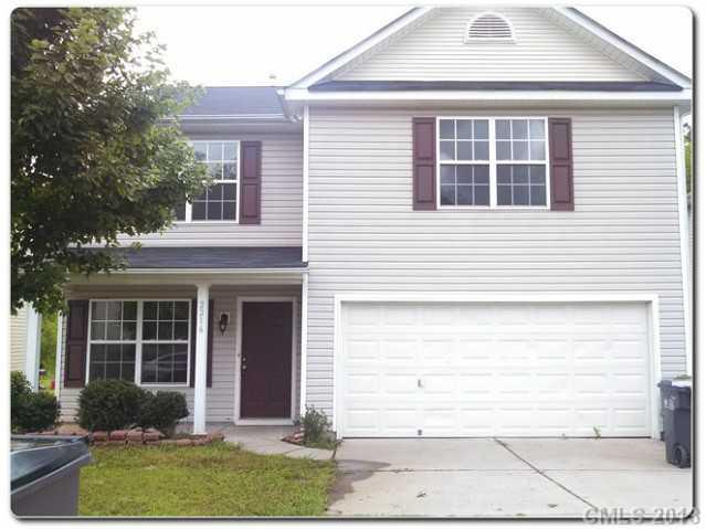 2216 Gooseberry Road Charlotte, NC 28208 - Photo 2 of 12 a front view of a house with garden