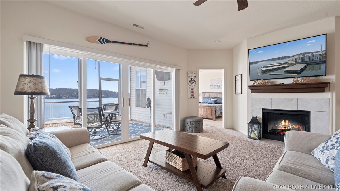 64 Knox Road, Unit N105 Rocky Mount, MO 65072 - Photo 9 of 62 LIVING ROOM WITH FIREPLACE