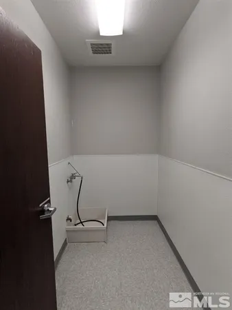 an empty room with a workbench