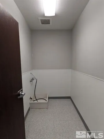 an empty room with a workbench