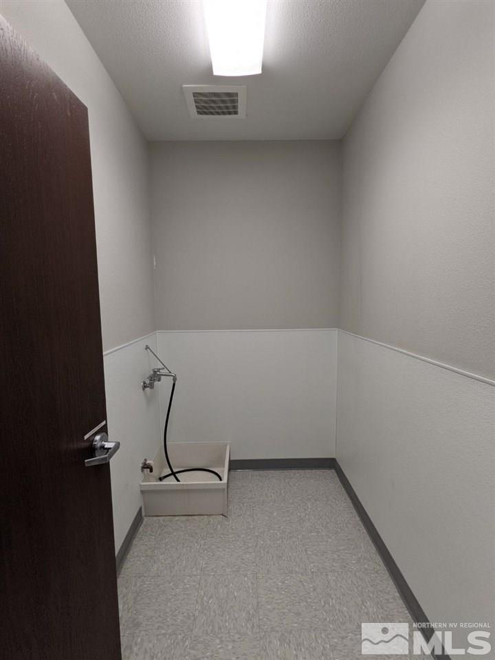 3745 North Carson Street, Unit 3745 Carson City, NV 89706 - Photo 19 of 33 an empty room with a workbench
