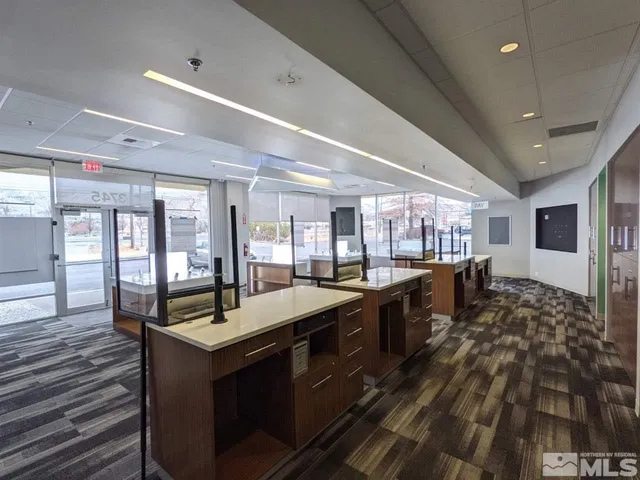 a bathroom with a shower and a sink