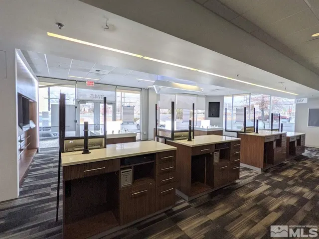 a large kitchen with lots of counter space and a sink