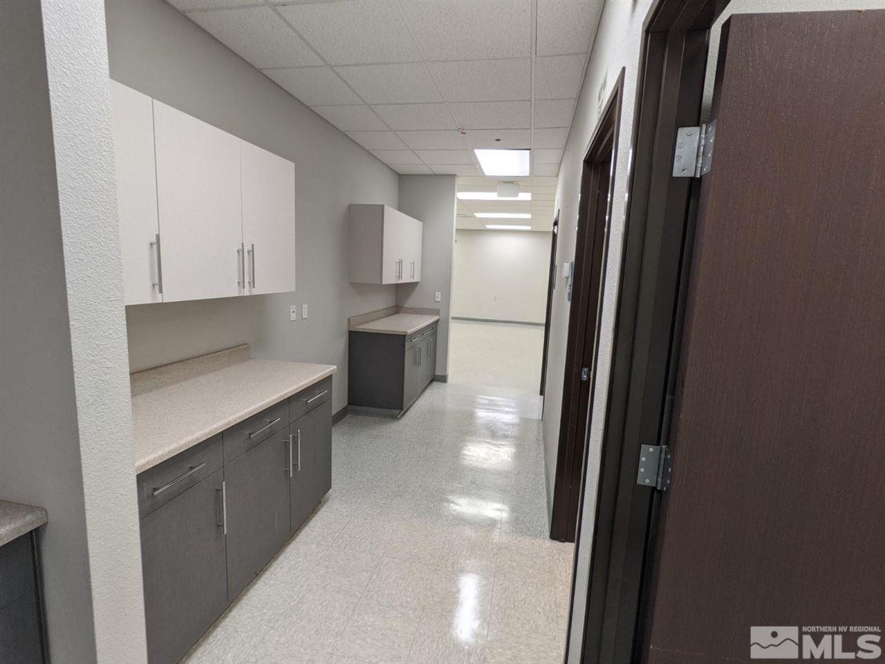 3745 North Carson Street, Unit 3745 Carson City, NV 89706 - Photo 9 of 33 a kitchen with stainless steel appliances a refrigerator and a sink