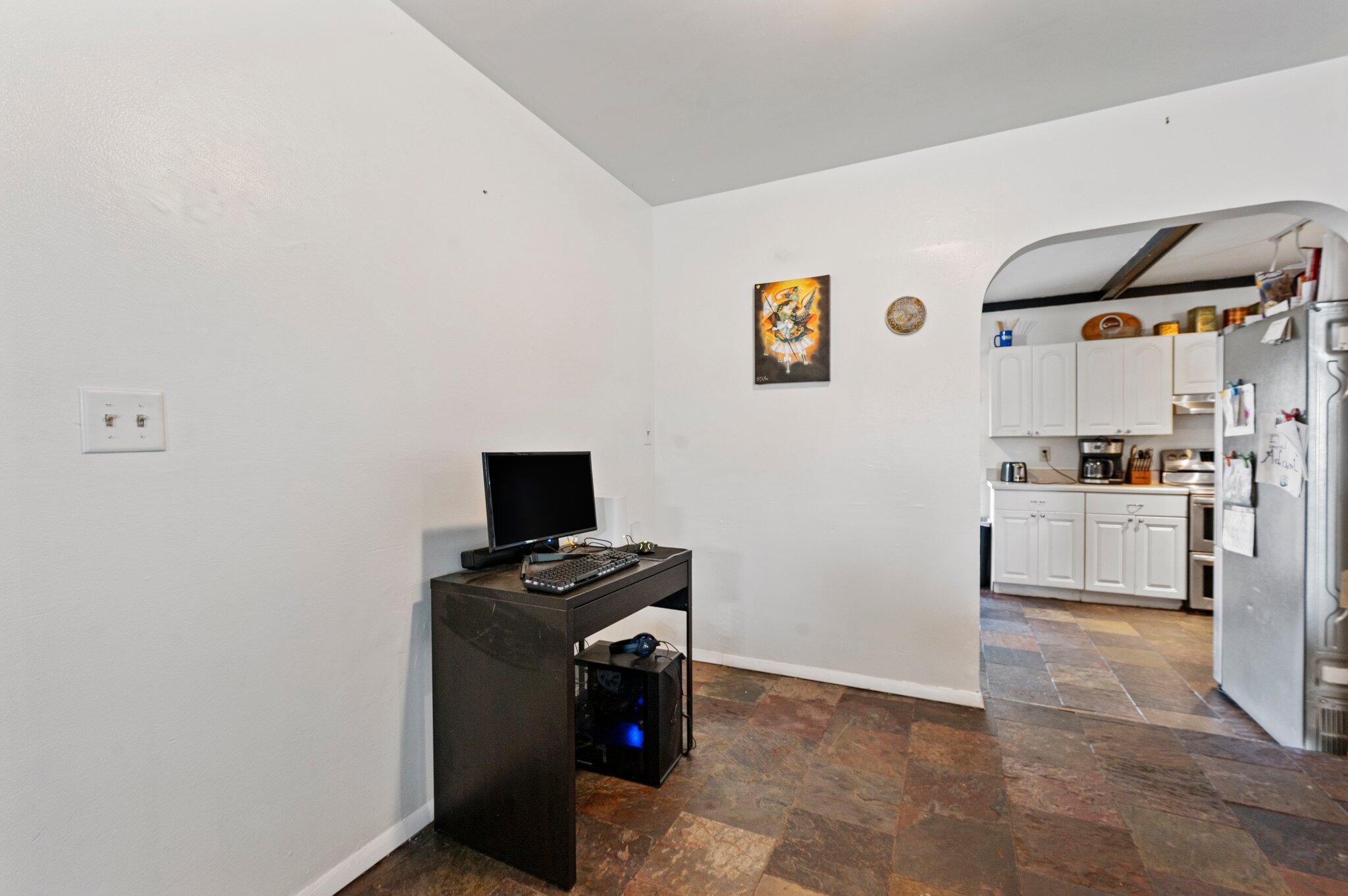 822 Onyx Drive Northeast Palm Bay, FL 32905 - Photo 6 of 21 a view of kitchen with cabinets and refrigerator