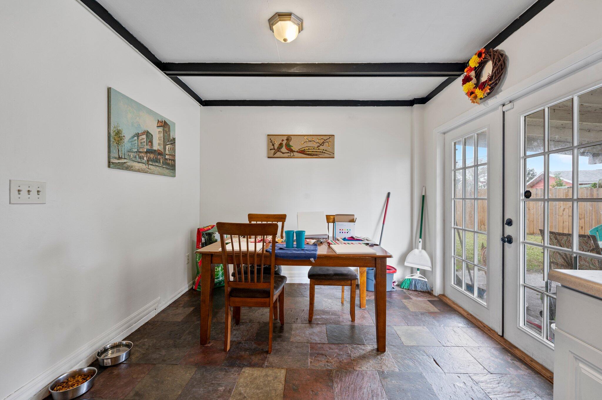 822 Onyx Drive Northeast Palm Bay, FL 32905 - Photo 9 of 21 a view of a livingroom with furniture and a dining table