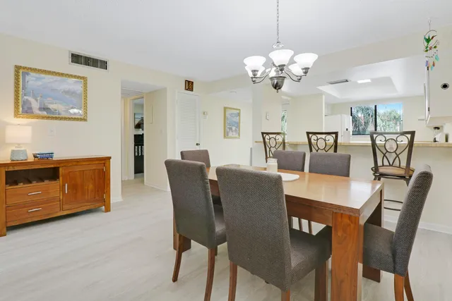 a living room with fireplace furniture and a flat screen tv