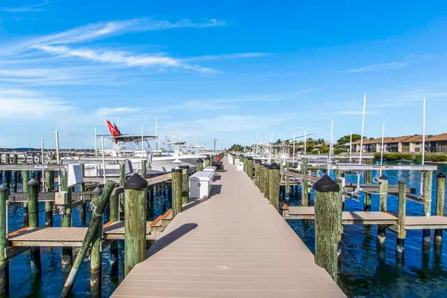 a view of a balcony with chairs
