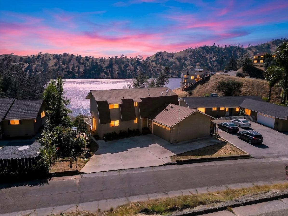 27817 Sky Harbour Road Friant, CA 93626 - Photo 1 of 36 a view of a terrace with a bench