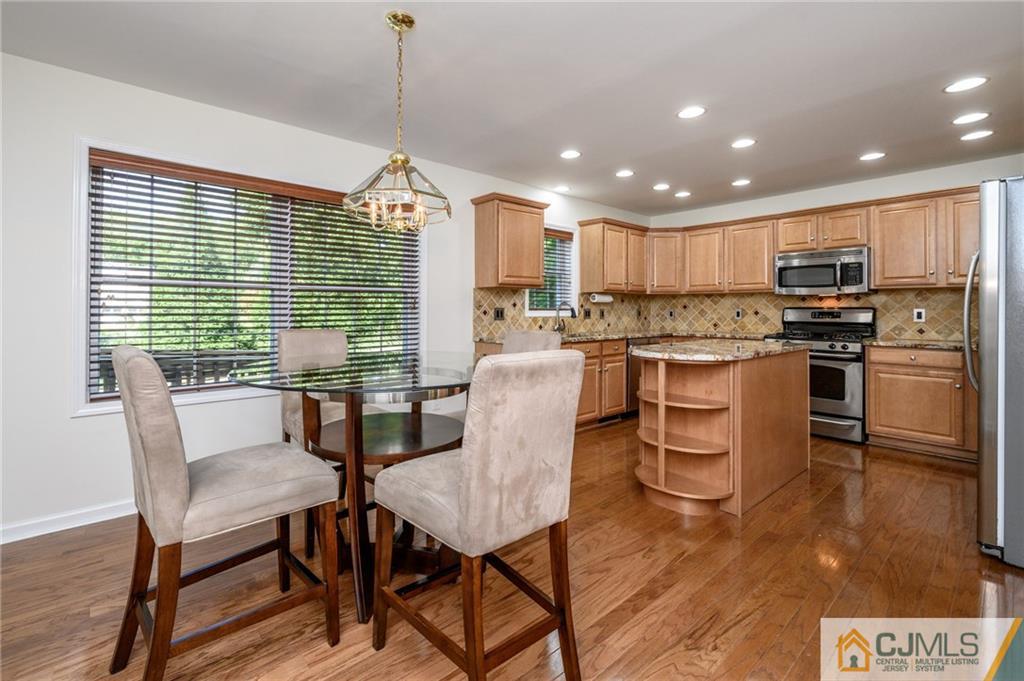 20 Blue Jay Hill Road Westampton, NJ 08060 - Photo 12 of 65 a view of a dining room with furniture window and wooden floor