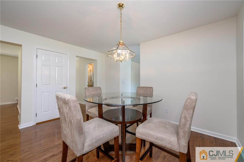 20 Blue Jay Hill Road Westampton, NJ 08060 - Photo 13 of 65 a view of a dining room with furniture and wooden floor