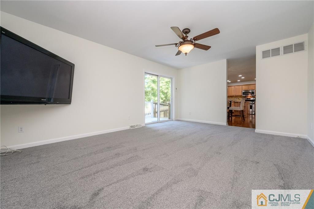 20 Blue Jay Hill Road Westampton, NJ 08060 - Photo 18 of 65 a view of a livingroom with a ceiling fan and a window