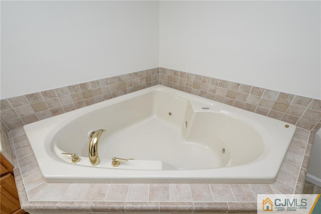20 Blue Jay Hill Road Westampton, NJ 08060 - Photo 27 of 65 a bath tub sitting in a bathroom