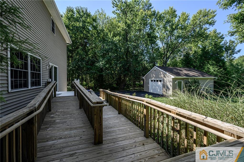 20 Blue Jay Hill Road Westampton, NJ 08060 - Photo 48 of 65 a balcony with wooden floor and outdoor space