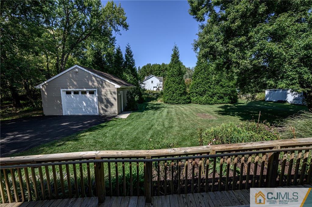 20 Blue Jay Hill Road Westampton, NJ 08060 - Photo 49 of 65 a front view of a house with a yard and fence