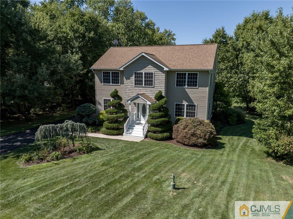 20 Blue Jay Hill Road Westampton, NJ 08060 - Photo 55 of 65 a front view of a house with a yard and green space