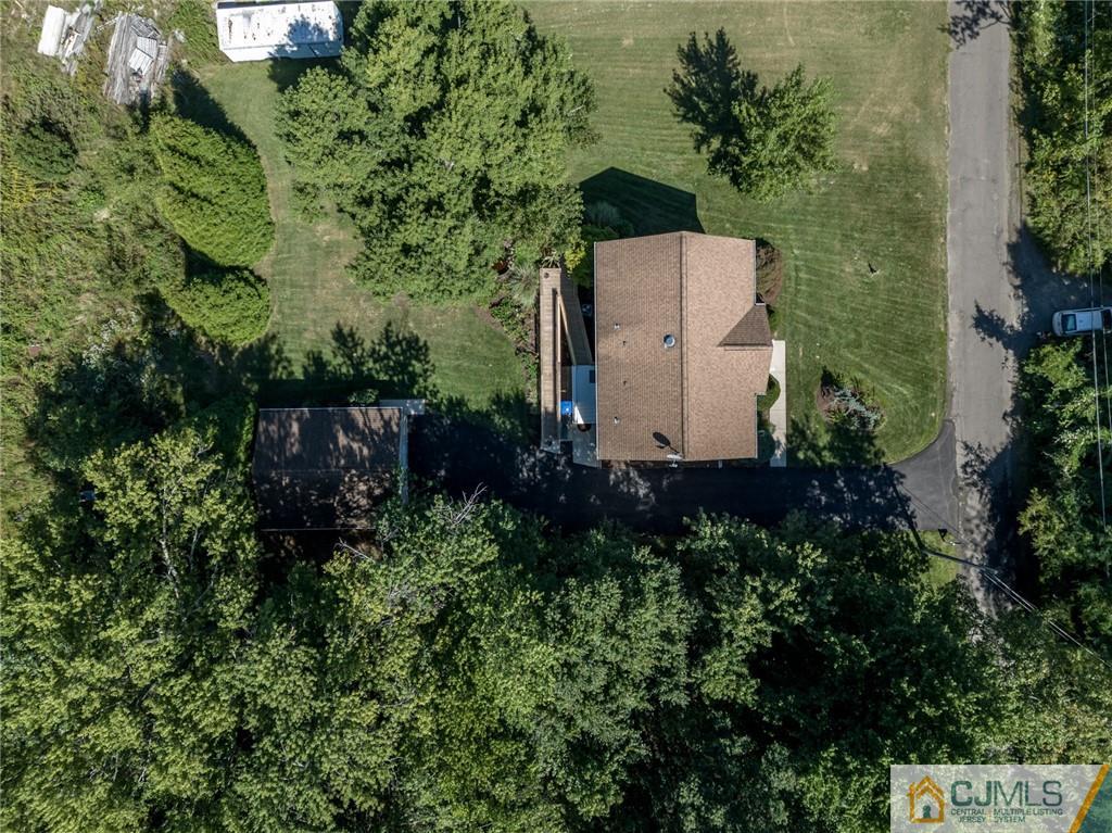 20 Blue Jay Hill Road Westampton, NJ 08060 - Photo 57 of 65 an aerial view of a house with a yard and outdoor seating