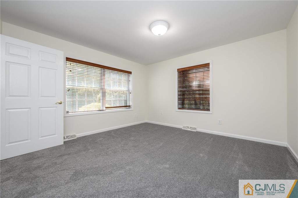 20 Blue Jay Hill Road Westampton, NJ 08060 - Photo 6 of 65 an empty room with windows