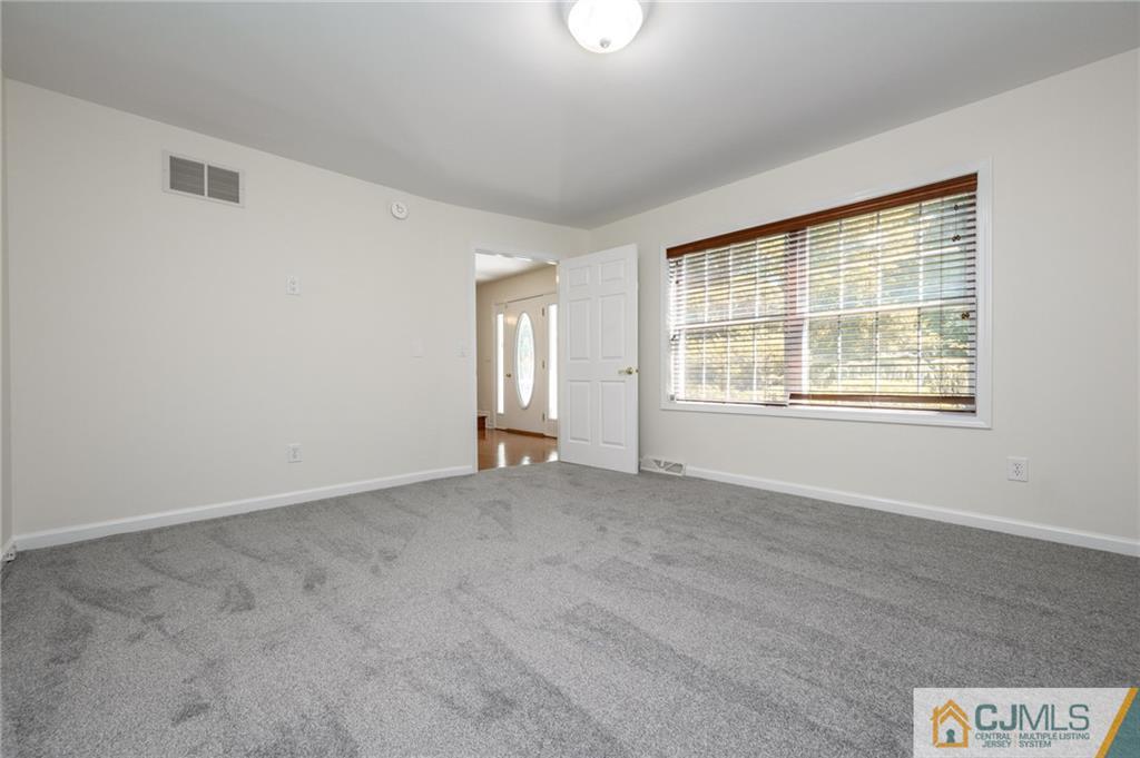 20 Blue Jay Hill Road Westampton, NJ 08060 - Photo 7 of 65 an empty room with windows