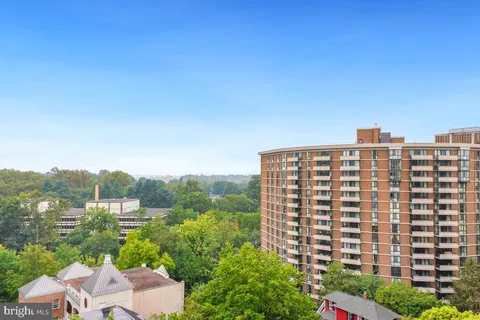 a view of a city with tall buildings