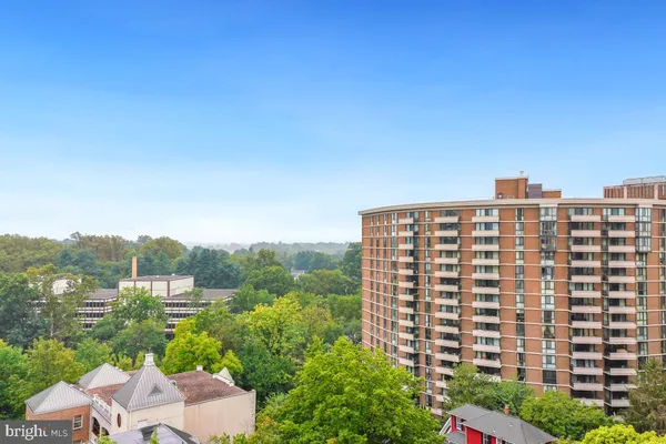 a view of a city with tall buildings