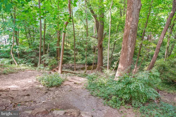 a view of street with tall buildings