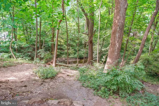 a view of street with tall buildings