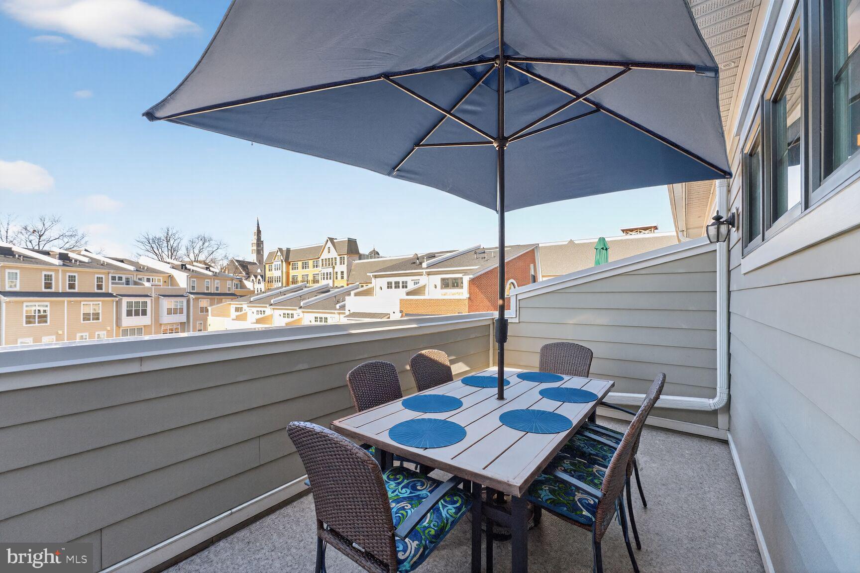 3328 7th Street Northeast Washington, DC 20017 - Photo 23 of 30 a balcony view with a table and chairs