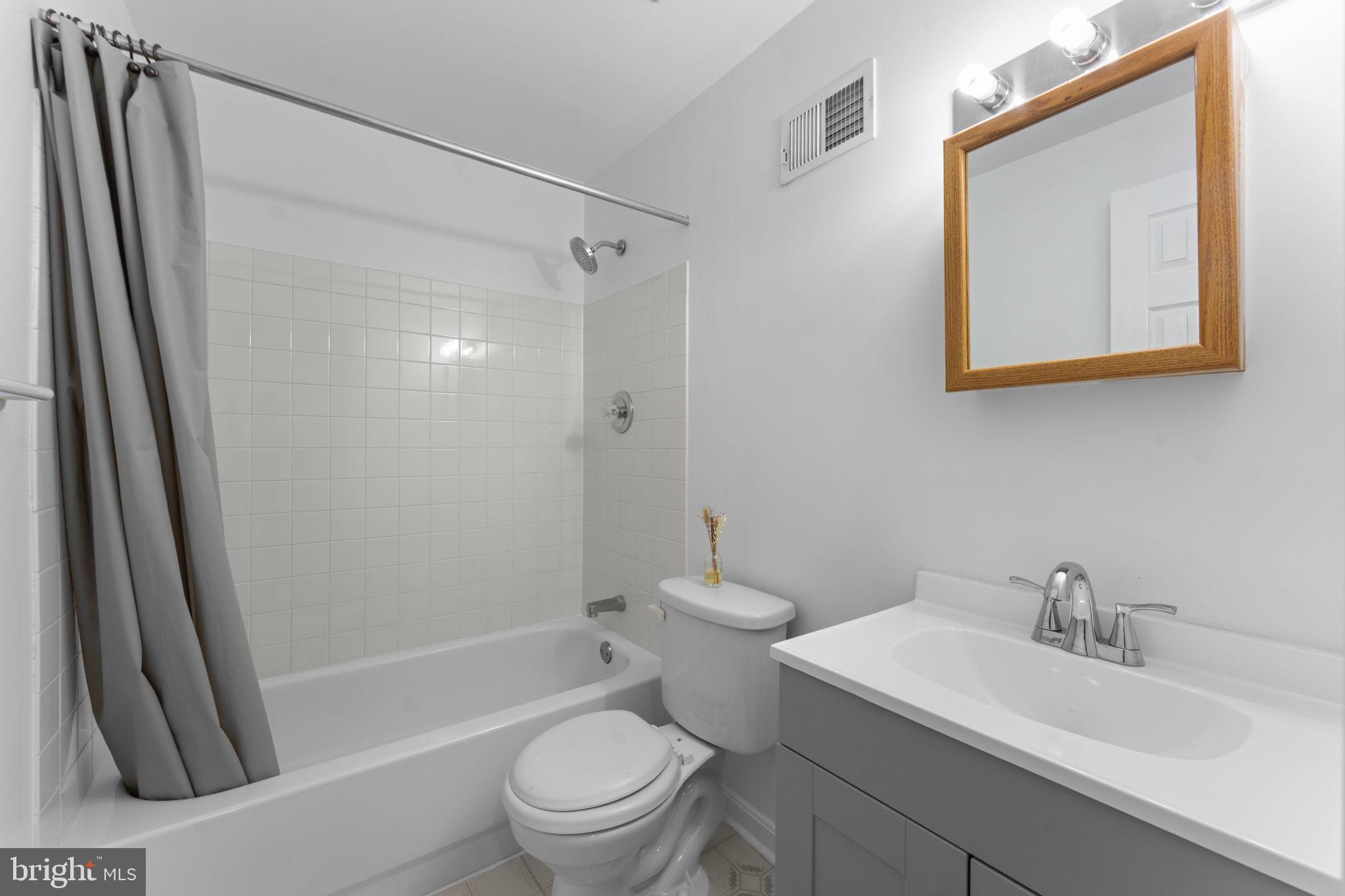 12705 Hawkshead Terrace Silver Spring, MD 20904 - Photo 35 of 52 a bathroom with a sink toilet and shower