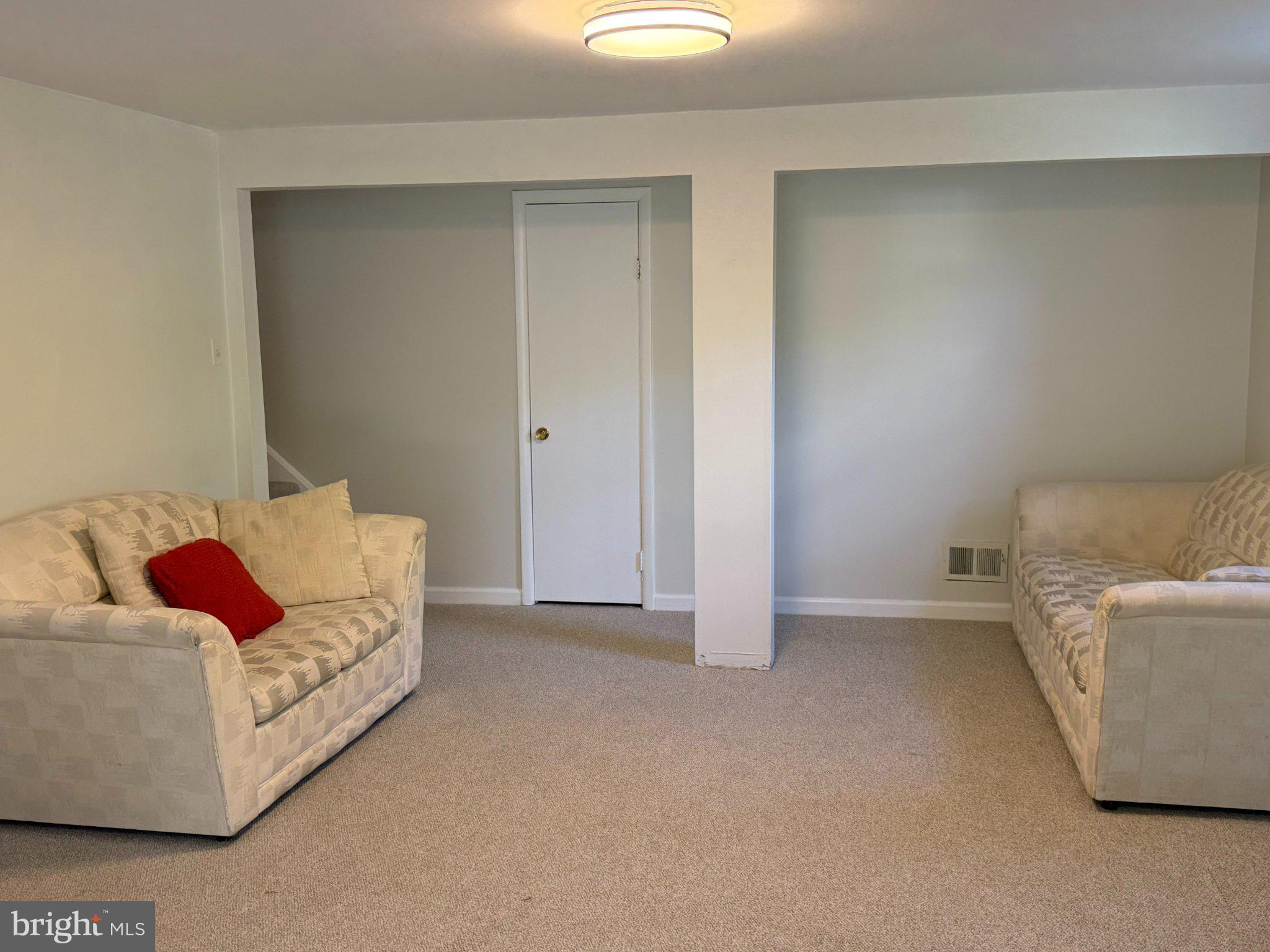 1009 Broadmore Circle Silver Spring, MD 20904 - Photo 12 of 46 Spacious, inviting living area awaits.