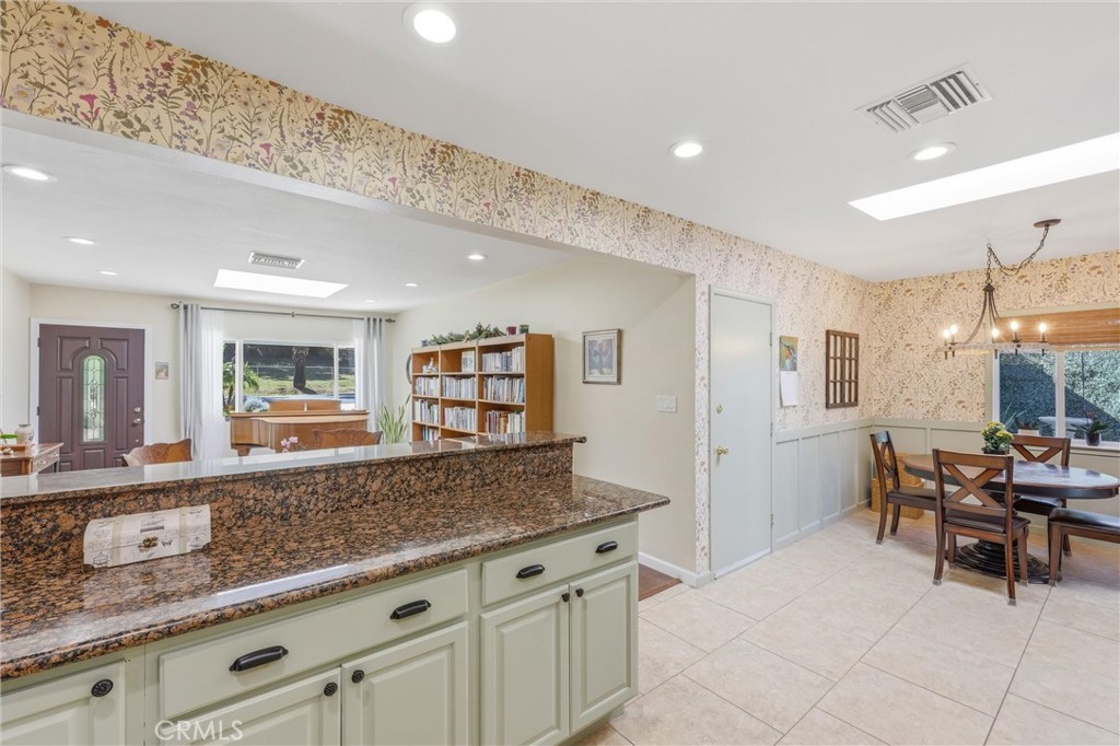 11 E Crescent Redlands, CA 92373 - Photo 15 of 35 a living room with granite countertop furniture and fireplace