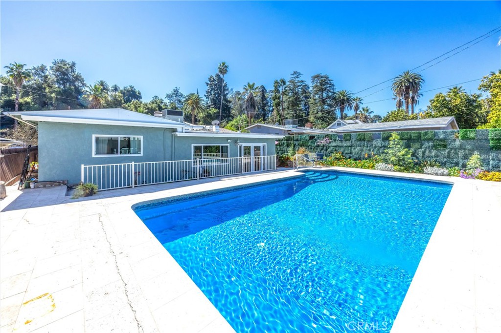 11 E Crescent Redlands, CA 92373 - Photo 2 of 35 a view of a house with pool and a yard