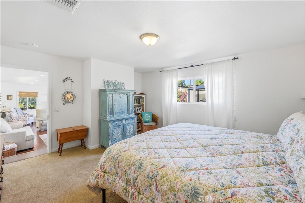 11 E Crescent Redlands, CA 92373 - Photo 21 of 35 a bedroom with a bed and window