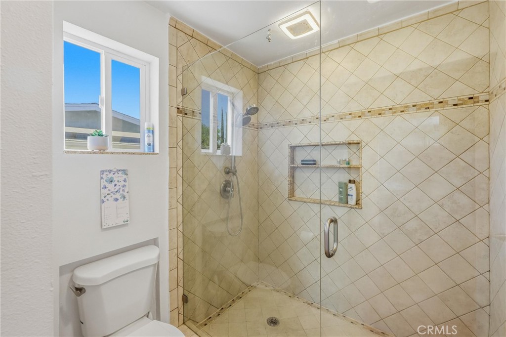 11 E Crescent Redlands, CA 92373 - Photo 24 of 35 a bathroom with a shower and toilet