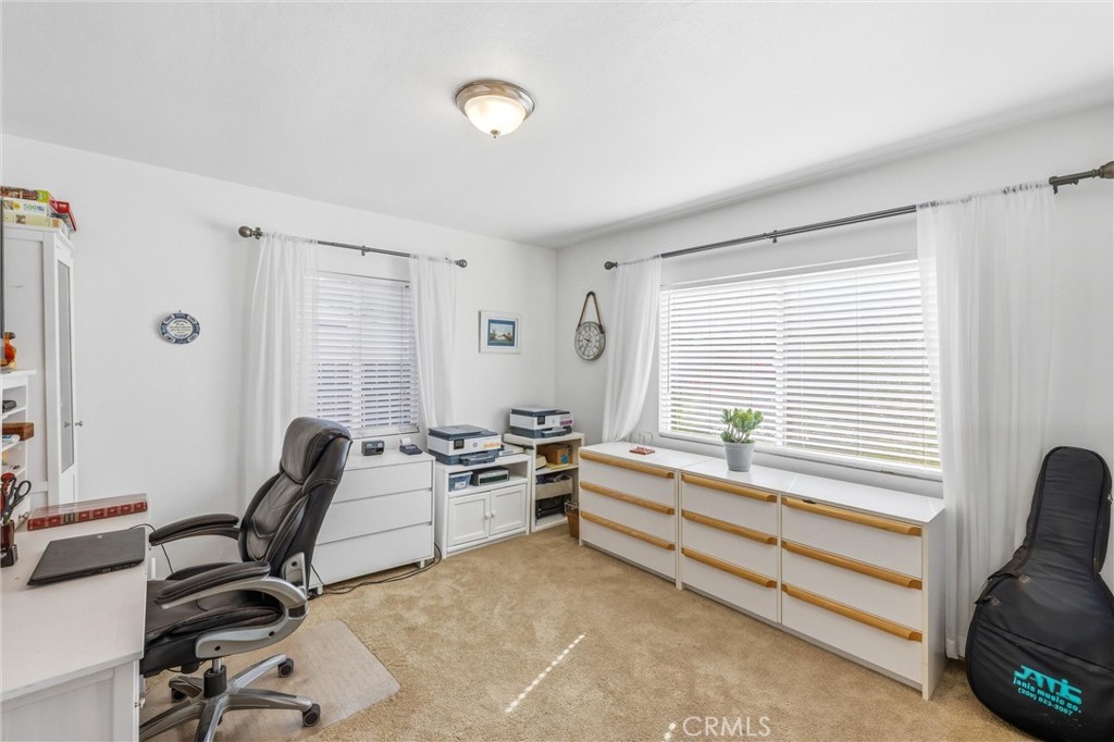 11 E Crescent Redlands, CA 92373 - Photo 25 of 35 a livingroom with workspace and a window