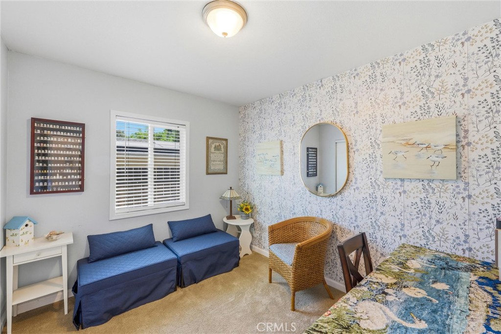 11 E Crescent Redlands, CA 92373 - Photo 27 of 35 a living room with furniture and a large window