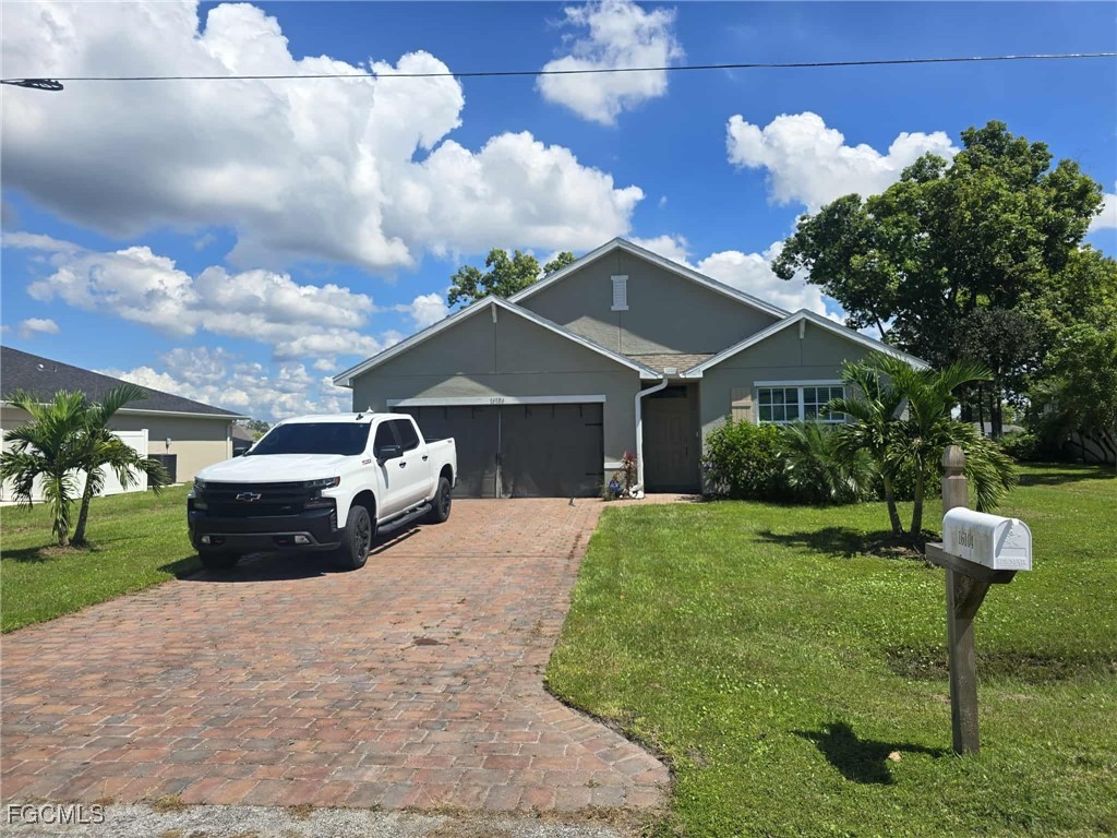 Undisclosed Address Punta Gorda, FL 33955 - Photo 1 of 17 a front view of a house with a yard