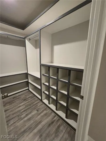 a view of an empty walk in closet