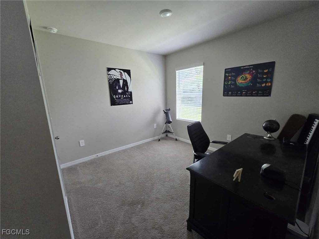 Undisclosed Address Punta Gorda, FL 33955 - Photo 15 of 17 a workspace with furniture and window