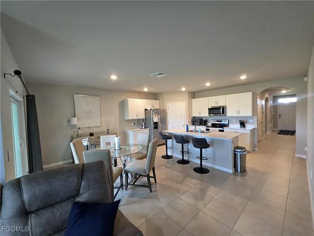 a view of a dining room with furniture