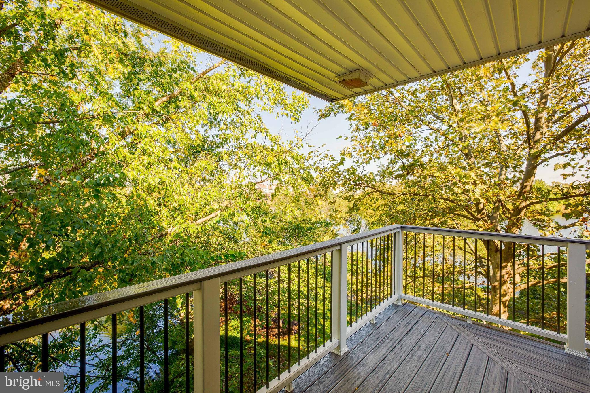 20575 Snowshoe Square, Unit 302 Ashburn, VA 20147 - Photo 13 of 32 a view of balcony with wooden floor