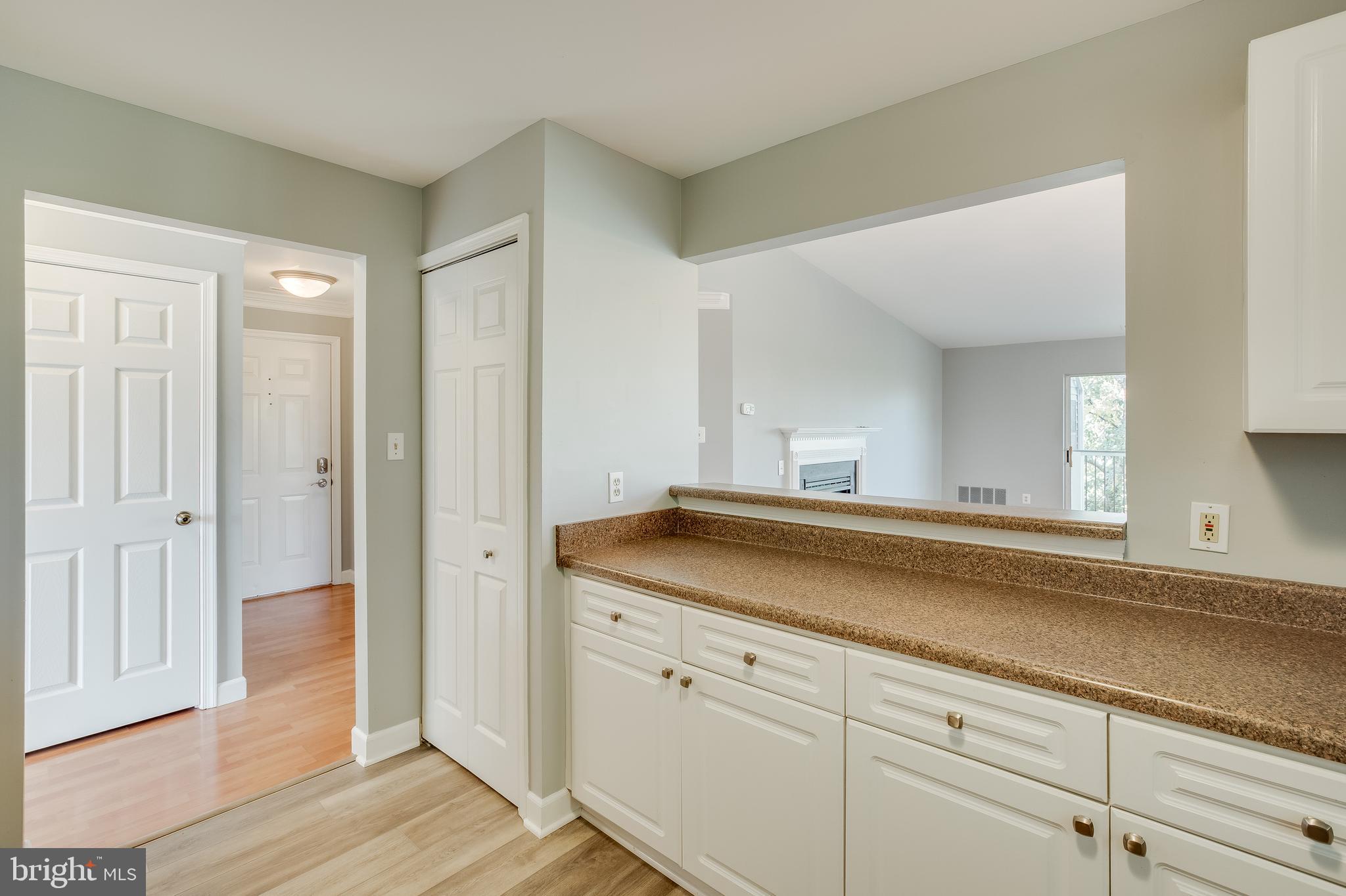 20575 Snowshoe Square, Unit 302 Ashburn, VA 20147 - Photo 9 of 32 a bathroom with a sink and a mirror