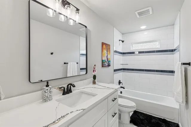 a bedroom with a bed and furniture