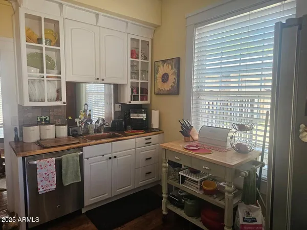 a bedroom with furniture and window