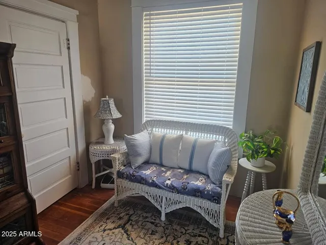 a bathroom with a sink a toilet a tub and a window