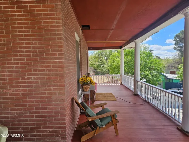 a bench sitting in front of a building