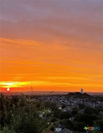 a view of a sky from a field